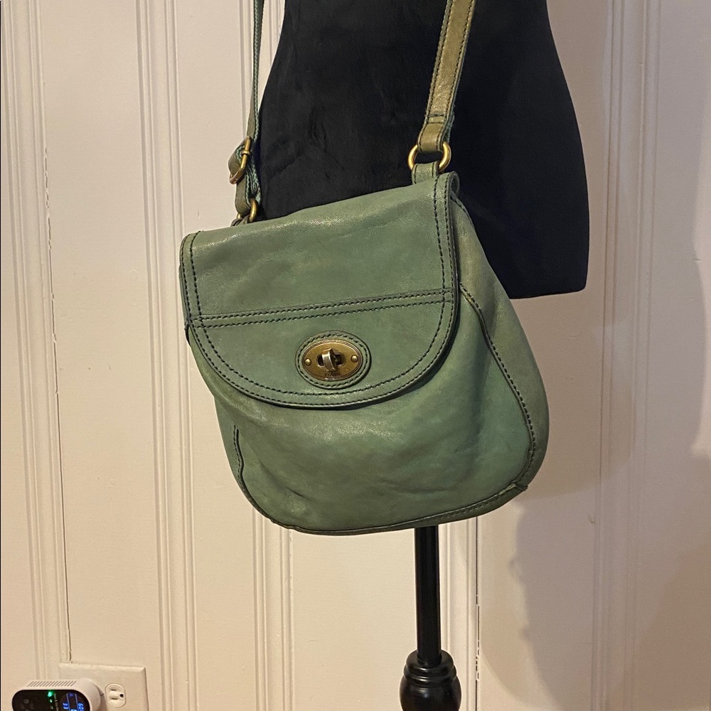 Green genuine lamb hide fossil crossbody purse with brass tone accents